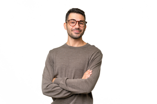 Young handsome caucasian man over isolated background with arms crossed and looking forward