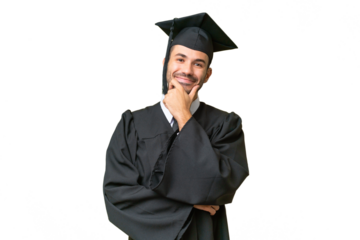 Young university graduate man over isolated background smiling