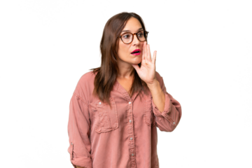Middle-aged caucasian woman over isolated background whispering something with surprise gesture while looking to the side