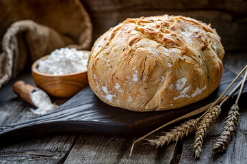 Fresh homemade bread on a wooden table