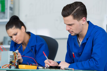 students in electronics class at university