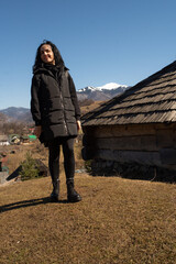 Beautiful smiling woman in the early spring park