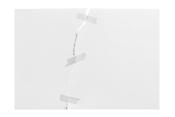 Torn sheet of paper glued with adhesive tape, cut out