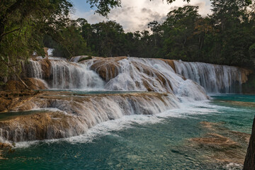 The Agua Azul waterfalls, a series of cascades of varying heights and widths, get their name from the colour of the water, which has a bright blue hue when accumulated,Mexico.