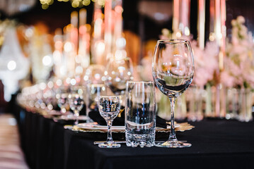 Plate and glass, stack, wine glass, luxury golden rich decor. Wedding set up, dinner table...