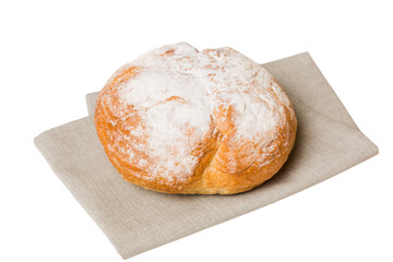 Freshly baked delicious french bread with napkin isolated on white background top view. Healthy white bread loaf