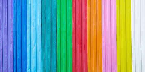 Background of multi-colored plasticine. Bright background for the designer. Web banner