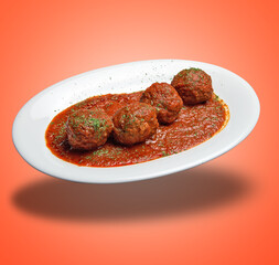 Floating White plate with Beef meats balls and tomato sausage