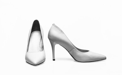 Stylish classic women leather shoe. Fashionable women shoes isolated on white background. White high heel women shoes on white background - obrazy, fototapety, plakaty