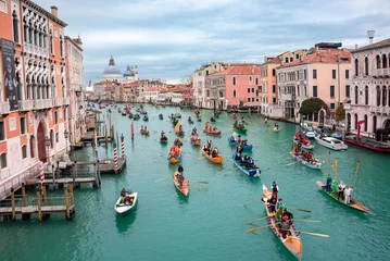 Foto auf Acrylglas Antireflex Venice, Italy, Grand canal. Venice carnival opening with gondola boat water parade © Maresol