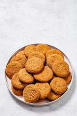 sweet soft ginger cookies on plate, top view