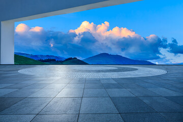 Square floor and mountain with sky cloud background at sunrise