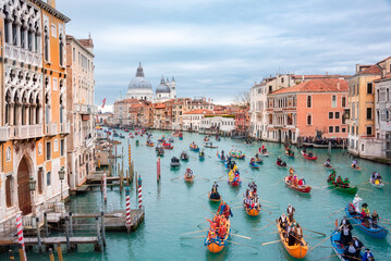 Venice, Italy, Grand canal. Venice carnival opening with gondola boat water parade