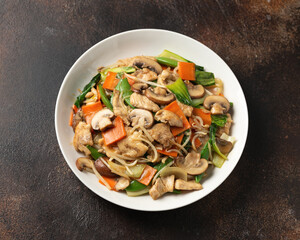 Chicken Chop Suey in white plate. Take away food
