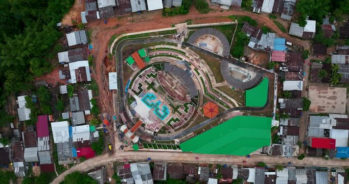 Contamana, Ucayali Province, Peru' - Small town city on the amazon river jungle rainforest isolated. 4k High resolution dronre fly view from above.