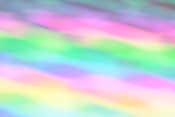 Waves abstract neon pastell rainbow blur gradient background. multicolored glowing texture