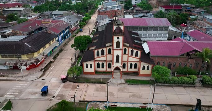 Contamana, Ucayali Province, Peru' - Small town city on the amazon river jungle rainforest isolated. 4k High resolution dronre fly view from above.