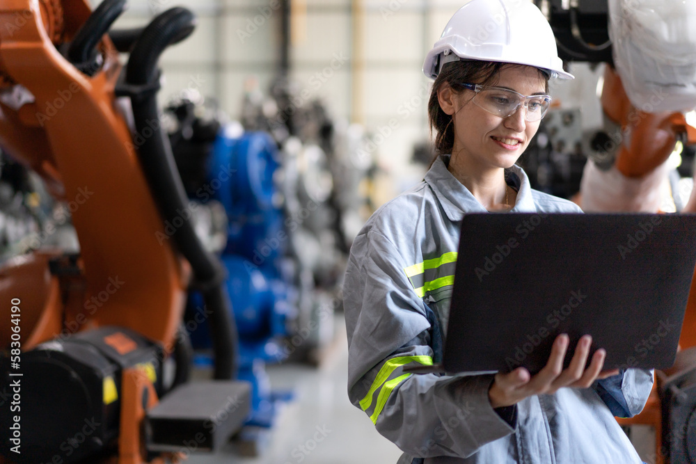 Wall mural industrial engineer working on robot maintenance in ai futuristic electronic technology factory. fem