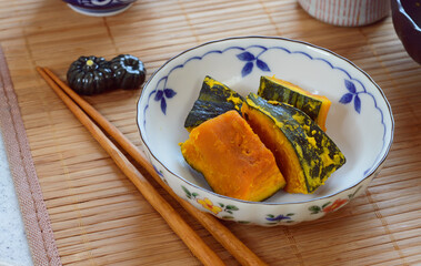 a bowl of Japanese style simmered pumpkin