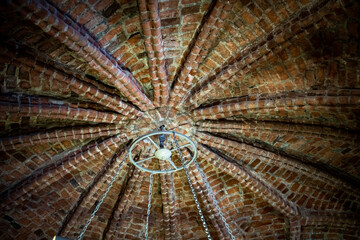 curly brick decoration of the ceiling and walls of ancient buildings of the Novgorod Kremlin