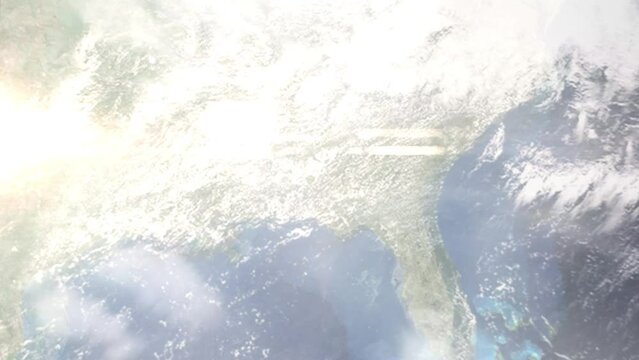 Earth zoom in from outer space to city. Zooming on Troy, Alabama, USA. The animation continues by zoom out through clouds and atmosphere into space. Images from NASA