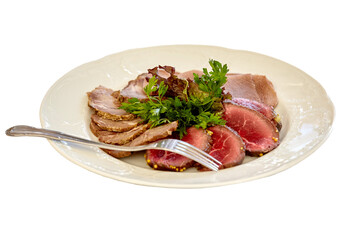 Appetizer plate with a meat selection. Sliced baked ham. Isolated