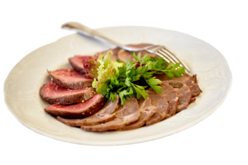 Appetizer plate with a meat selection. Sliced baked ham. Isolated