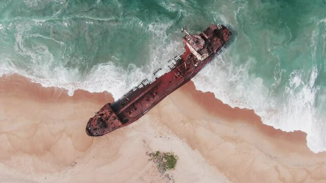 an abandoned shipwreck on the coast of Robertsport, Liberia, Africa
