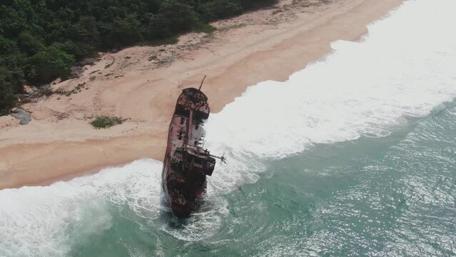 a shipwreck abandoned at the west african coast in Robertsport, Liberia