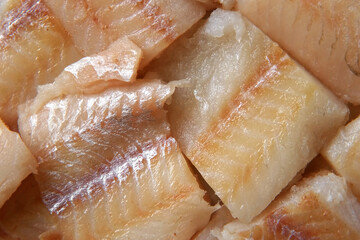 Raw fish fillet is spinning. Top view. Slices of fresh whitefish. Full frame. Sashimi rotation....
