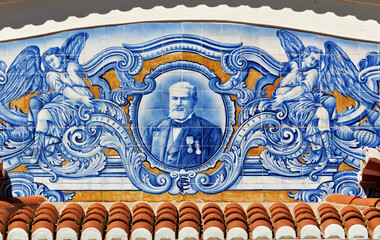 panel of azulejos tiles on the facade of old railways station in Aveiro, Portugal