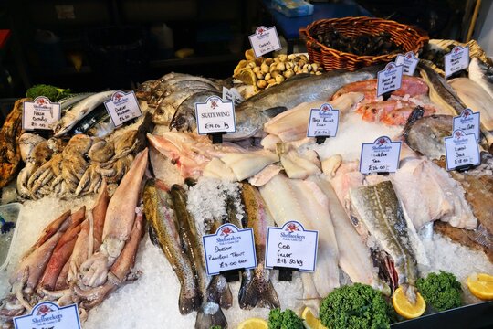 LONDON, UK - APRIL 22, 2016: Fish stall at Borough Market in Southwark, London. It is one of oldest markets in Europe. Its 1,000th birthday was in 2014.