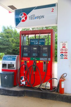 PALAWAN, PHILIPPINES - NOVEMBER 30, 2017: Gas pumps at Caltex gas station in Palawan, Philippines. Caltex is a brand name of Chevron Corporation.