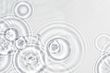 Abstract water, cosmetic background with rings, water surface. Spa concept background. Splash...