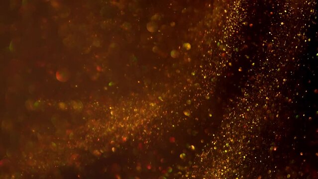 Shining golden particles abstract background. Gold abstraction background of gold dust particles