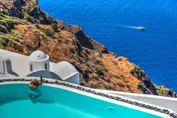 view of the sea from a hotel pool in Santorini