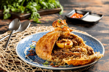 Lamb Ghouzi or quzi rice wrap served in dish isolated on table top view of arabic breakfast