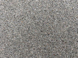 Gray dark stone grainy crumb textured background