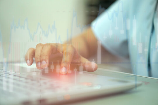 Human hands are trading stocks.