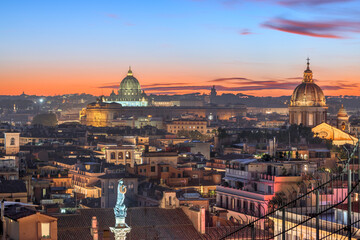 Rome, Italy historic city skyline with basilicas at dusk.