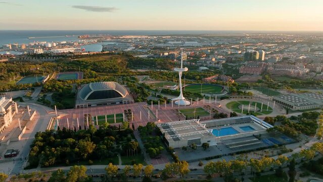 Aerial video of Barcelona, Montjuic on sunset. Palau Sant Jordi, Anella Ol&iacute;mpica.