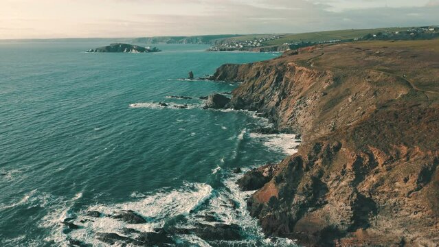 Ocean waves crashing on wild coastline in South Devon, England