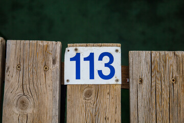 sign of number 113 on a deck