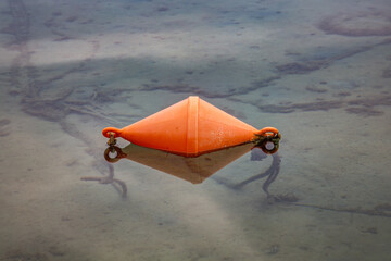 orange buoy in the sea