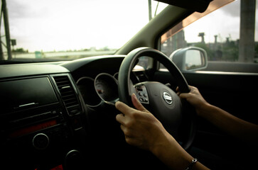 person driving a car