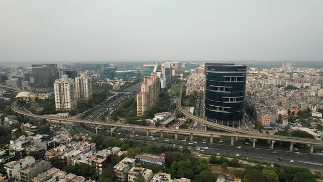 Aerial Drone Footage of Buildings Exteriors at Dlf Cyberhub Cybercity Gurgaon Gurugram Delhi India rapid metro station