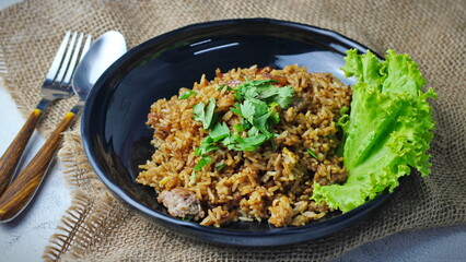 Fried rice in black plate,Train fried rice,Chinese style fried rice,Thai food.