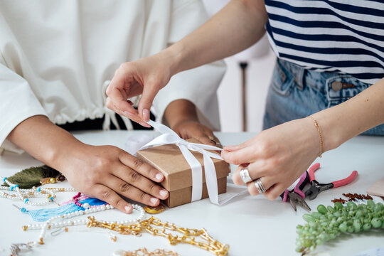 Craft Marketing Ideas for Small Businesses. Smart Marketing Strategies for Handmade Businesses. Female designers working together and making jewelry - Powered by Adobe