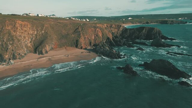 Ocean waves crashing on wild coastline in South Devon, England