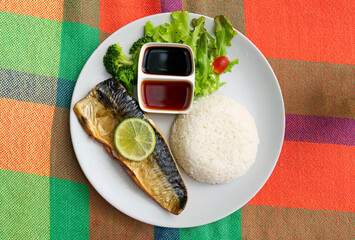 Grilled Saba or Mackerel menu with sweet sauce, vegetable and rice on white plate